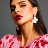 FLORAL EARRINGS WITH PEARL DETAILS