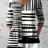 BLACK & WHITE LONG BLOUSE WITH V-NECK