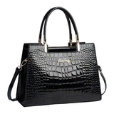 GLOSSY CROC-EMBOSSED HANDBAG