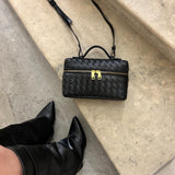 STRUCTURED WOVEN BAG WITH GLOSS FINISH