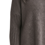 FIGURE-HUGGING TURTLENECK TOP