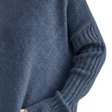 FIGURE-HUGGING TURTLENECK TOP