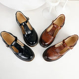 BROGUE SHOES WITH FLORAL DETAILS