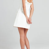 FEMININE MINI DRESS WITH FLORAL APPLIQUÉS